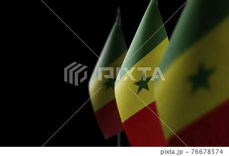 Small national flags of the Senegal on a black background Small national flags of the Senegal on a black background 76678574