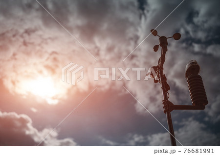 modern anemometer or weather wind vane for measuring meteorology conditions 76681991