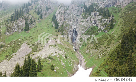 Green gorge with forest in the mountains. Green gorge with forest in the mountains. 76684845
