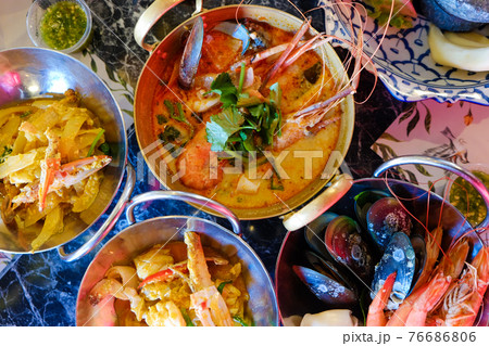 Tom Yum Kung River prawn spicy soup with many seafood boiled serve in restaurant 76686806