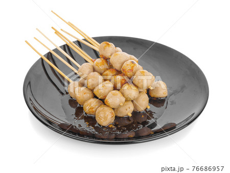meatball skewers on bamboo stick with sauce an isolated meatball skewers on bamboo stick with sauce an isolated 76686957
