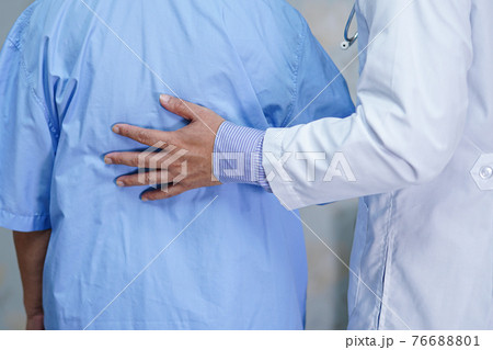 Doctor touching Asian senior or elderly old lady woman patient with love, care, helping, encourage and empathy at nursing hospital ward Doctor touching Asian senior or elderly old lady woman patient with love, care, helping, encourage and empathy at nursing hospital ward 76688801