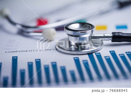 Stethoscope on spreadsheet paper, Finance, Account, Statistics, Investment, Analytic research data economy spreadsheet and Business company concept. 76688945