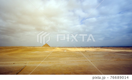 Far view Red Pyramid from Bent pyramid showing landmark architecture on desert landscape 76689014