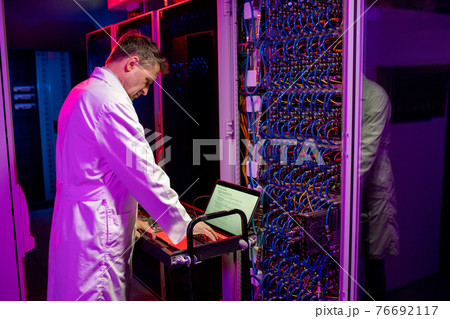Network engineer configurating blade server 76692117