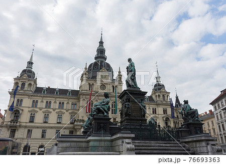 Erzherzog Johann fountain at Hauptplatz (main square) and Town Hall in the background, in Graz, Styria region, Austria. 76693363