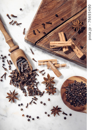 Set of spices on marble table Set of spices on marble table 76693490