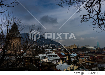 Old Tbilisi with narrown street and red roofs 76694158