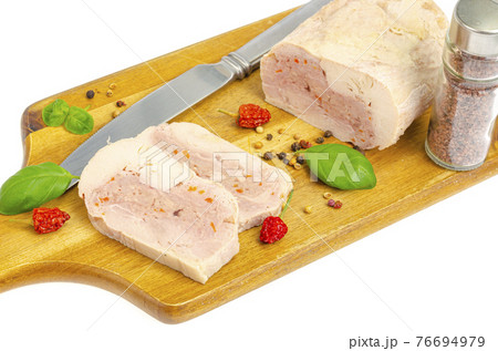 Homemade chicken fillet meat roll with vegetables and spices 76694979