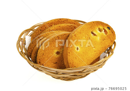 Wheat rusks with raisins on white background. Wheat rusks with raisins on white background. 76695025