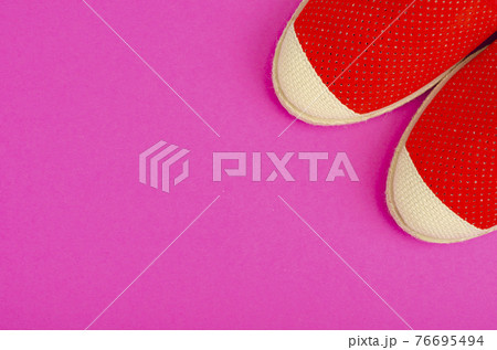 Summer composition of hats and shoes on bright background 76695494