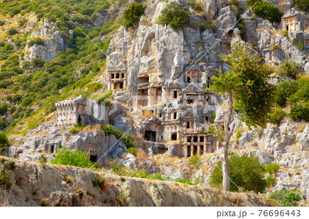 Ancient lycian rock tomb ruins in Demre, former Myra, Antalya, Turkey 76696443
