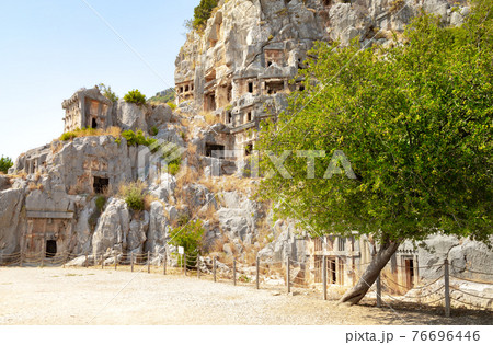 Ancient lycian rock tomb ruins in Demre, former Myra, Antalya, Turkey 76696446
