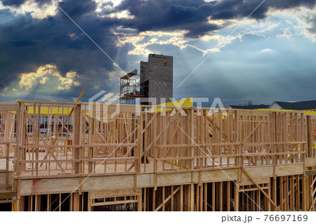 Exterior with wood framing beam of new house under construction beam wood Exterior with wood framing beam of new house under construction beam wood 76697169