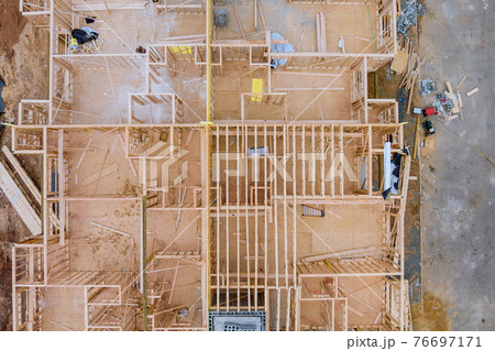 Wood building frame structure on a new development 76697171