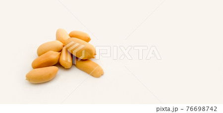 peeled peanuts on white background peeled peanuts on white background 76698742