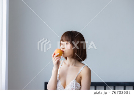 Portrait asian young woman wearing sexy bikini in bedroom Portrait asian young woman wearing sexy bikini in bedroom 76702685