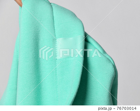 Closeup of modern mint color hood seamy side, cowl Closeup of modern mint color hood seamy side, cowl 76703014