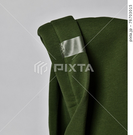 Closeup of deep green color hood with curved edge 76703015