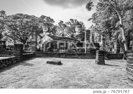 Landmark of old chedi made of ancient bricks in the Kamphaeng Phet Historical Park, Thailand. Black and white Landmark of old chedi made of ancient bricks in the Kamphaeng Phet Historical Park, Thailand. Black and white 76705767