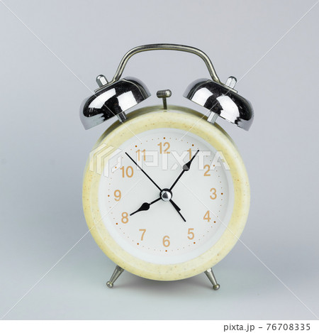 close up of clock isolated on gray background 76708335