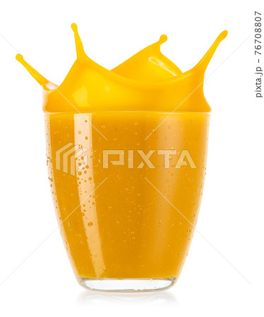 glass of splashing mango smoothies isolated on white 76708807