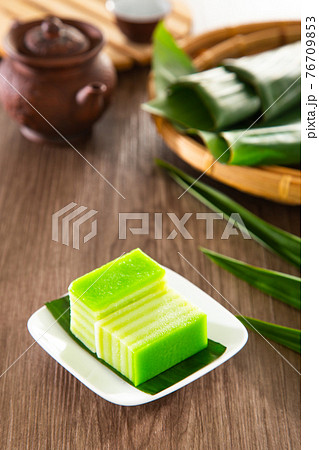 Kuih lapis is a traditional Malay nyonya sweet desert on wooden table 76709853