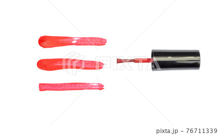 Red nail polish on a white background. Red nail polish on a white background. 76711339