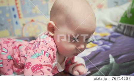 Photo of lying baby five month girl 76714287