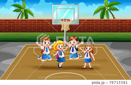 Cheerful school children jumping on the basketball court 76715581