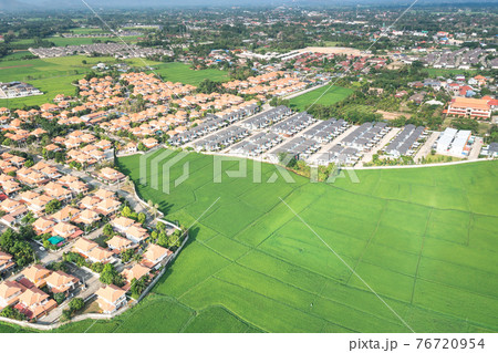 Land plot and green field in aerial view. 76720954