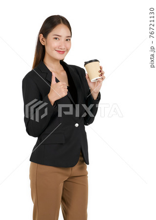 Young asian women in black suit with a smile lifted a finger thumb up while holding a cup of coffee. Portrait on white background with studio light. 76721130