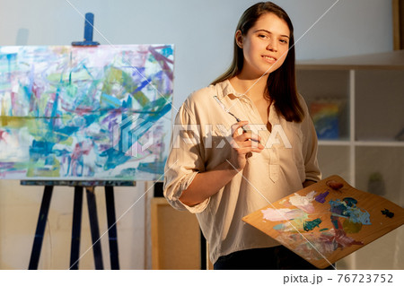 female artist painting school creating artwork female artist painting school creating artwork 76723752