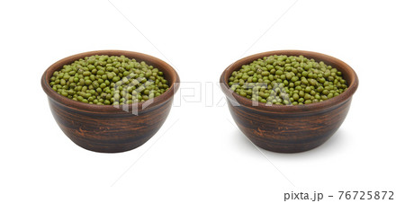 mung beans in clay bowl on white background, isolated and with shadow mung beans in clay bowl on white background, isolated and with shadow 76725872