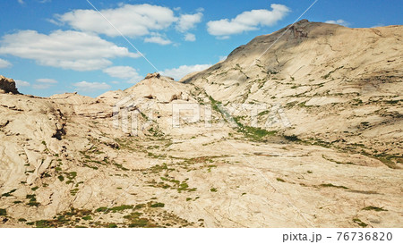 Huge rocks from lava. A former volcano. Huge rocks from lava. A former volcano. 76736820