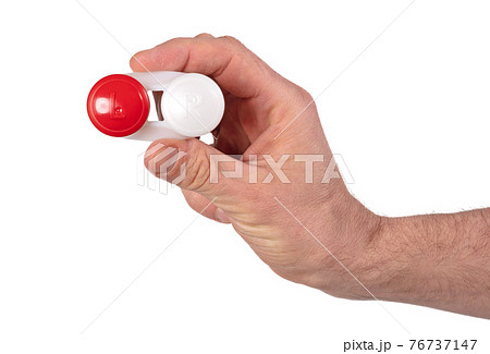Man hand is holding contact lens case 76737147
