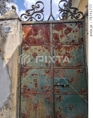 old rusted metal door fence old rusted metal door fence 76741777
