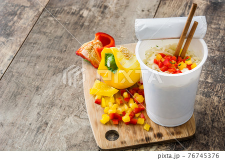 Take away noodles with vegetables 76745376