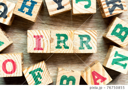 Alphabet letter block in word IRR (Abbreviation of internal rate of return) with another on wood background Alphabet letter block in word IRR (Abbreviation of internal rate of return) with another on wood background 76750855