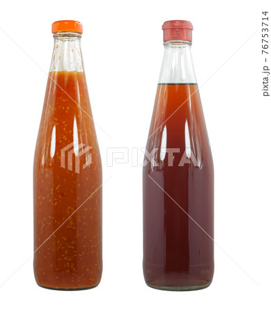 Bottles with tasty sauces isolated on white background 76753714