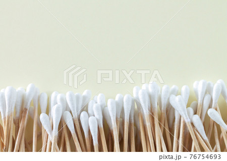 Heap of bamboo cotton swabs or buds overhead Heap of bamboo cotton swabs or buds overhead 76754693