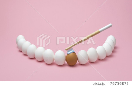 Brushing teeth concept. Oral hygiene using wooden toothbrush Brushing teeth concept. Oral hygiene using wooden toothbrush 76756875