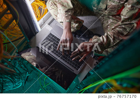 Woman Managing Server Network Top View Woman Managing Server Network Top View 76757170