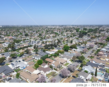 Aerial view of Lakewood middle class neighborhood, city in Los Angeles County, California 76757246