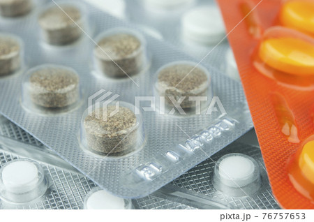 Pills in packs. 76757653