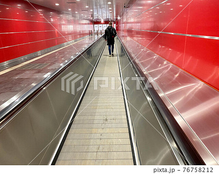 Automatic walkway, flat escalator for passenger. Travellator, travelator, moving walkway Automatic walkway, flat escalator for passenger. Travellator, travelator, moving walkway 76758212