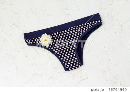 Beautiful women's cotton panties on white background. Beautiful women's cotton panties on white background. 76764949