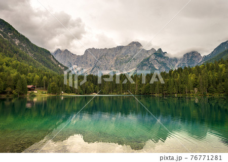 Fusine Lake and the Mountain Range of Mount Mangart - Julian Alps Italy 76771281