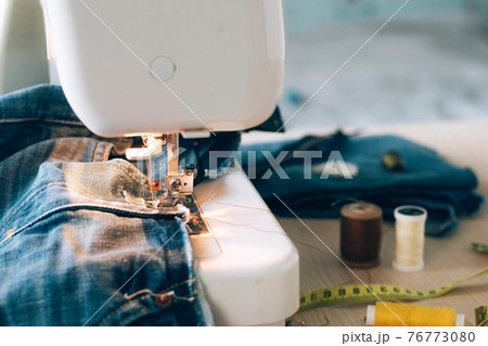 Sewing machine sewing accessories scissors thread buttons for repairing or sewing clothes on a desktop Sewing machine sewing accessories scissors thread buttons for repairing or sewing clothes on a desktop 76773080