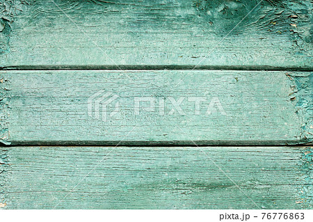 Texture background of old wooden board with peeling paint 76776863